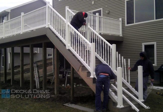 Vinyl Railing in process of getting built on stairs