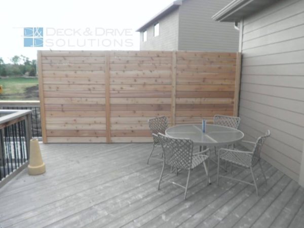 New Cedar Privacy wall with horizontal decking on existing cedar deck