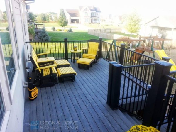 gray decking and yellow furniture