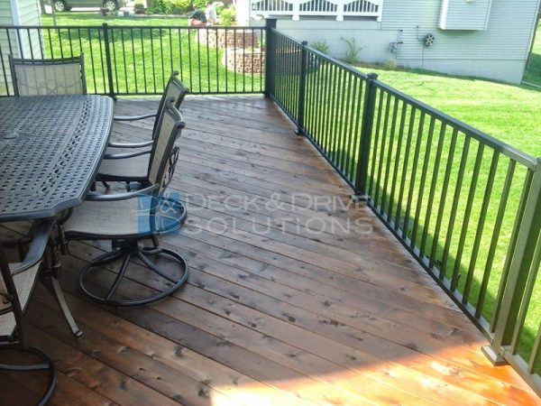 Cedar stained Mission Brown with Aluminum Railing
