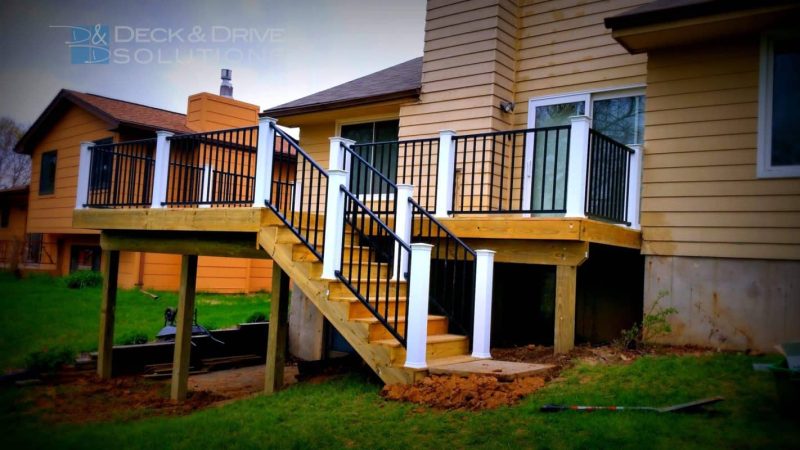 Treated Deck with White PVC Post and Black Westbury Railing