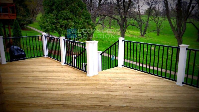 Treated decking with White PVC Post and Black Westbury Railing