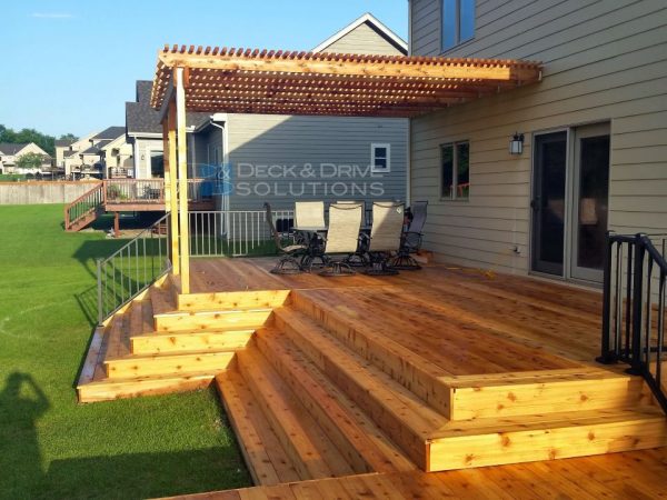 Many Stairs on cedar deck with pergola