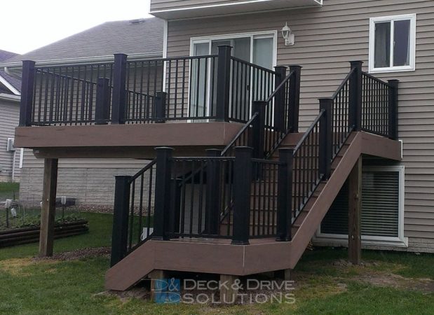 Composite Deck stair landing with Legacy Timbertech Pecan and Black Railing