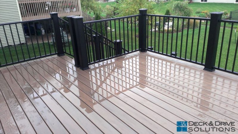 5" railing posts and Westbury metal railing on wet composite deck 