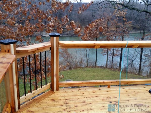cedar deck with cedar glass railing overlooking the river