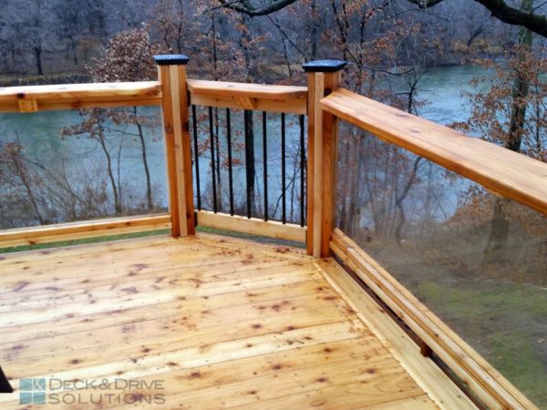 mixture of railing styles on a cedar deck