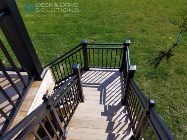 cedar stairs with metal railing