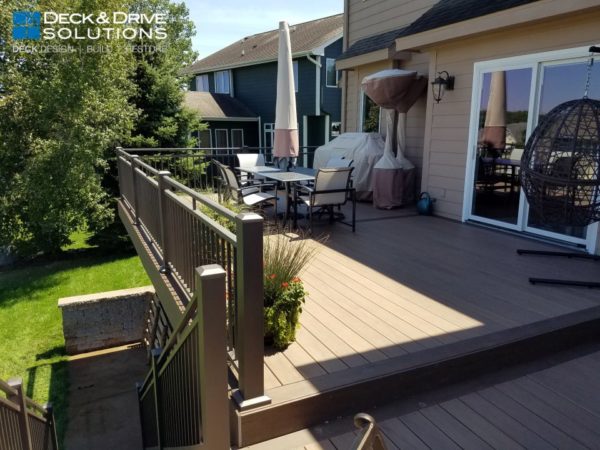 Timbertech deck with 4" and 2" railing posts and Westbury Rivera Railing