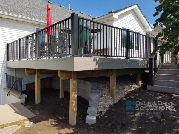 New Deck over retaining wall with Timbertech Ashwood Decking and Westbury Black Metal Railing