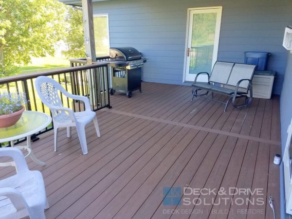 Timbertech brown oak deck with picture frame board on partial covered