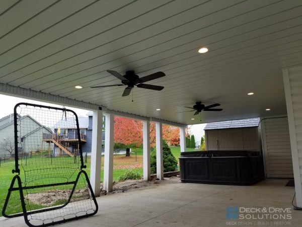 Under Deck Ceiling with Inside Out Aluminum Panels and ceiling fan with lights, hut tub under deck