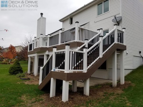 composite deck stairs with landing before landscaping