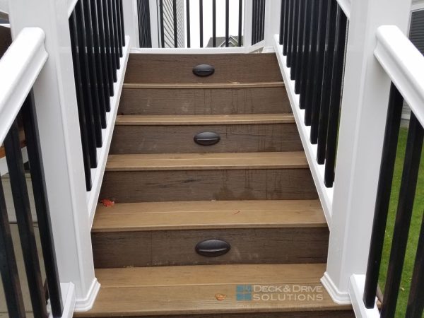 Timbertech stair lights on composite deck stairs