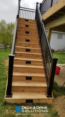 cedar deck stairs with outdoor lights