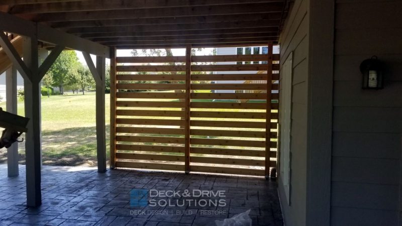 privacy wall below deck with cedar 1x4