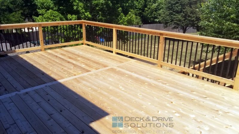 Cedar decking with picture frame board and cedar post rail