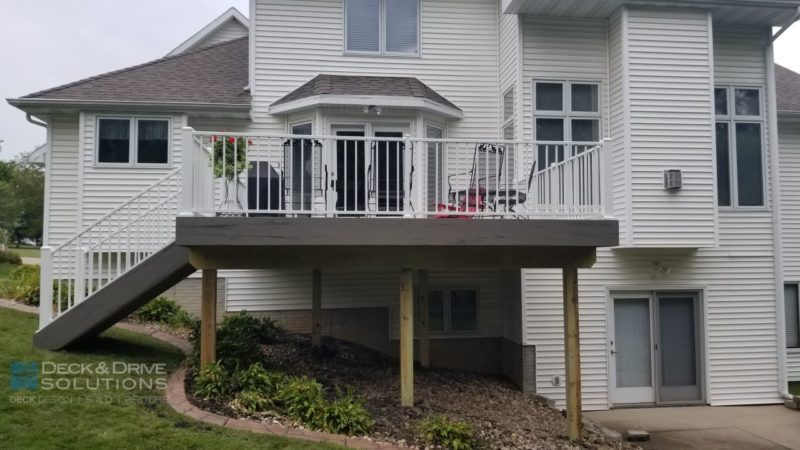 Timbertech Fascia Silver Maple with white house and white metal railing