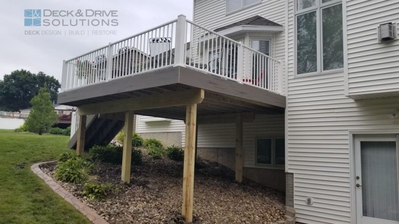 Timbertech Fascia Silver Maple with white house and white metal railing