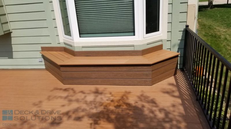 Custom Deck Bench on bay window with Timbertech Composite Antigua Gold for the seat and Antique Palm for the vertical