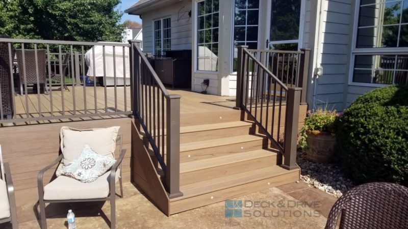new deck stairs with deck lights and bronze metal railing
