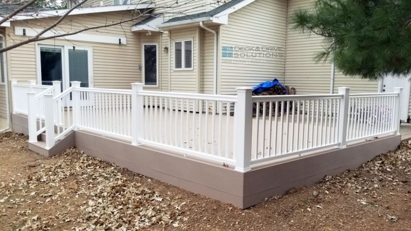 White composite rail on tan composite deck