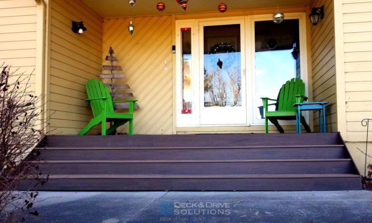 Front Porch with wide stairs using Timbertech composite decking in Pecan and Mocha, Front Porch with green chair on yellow house
