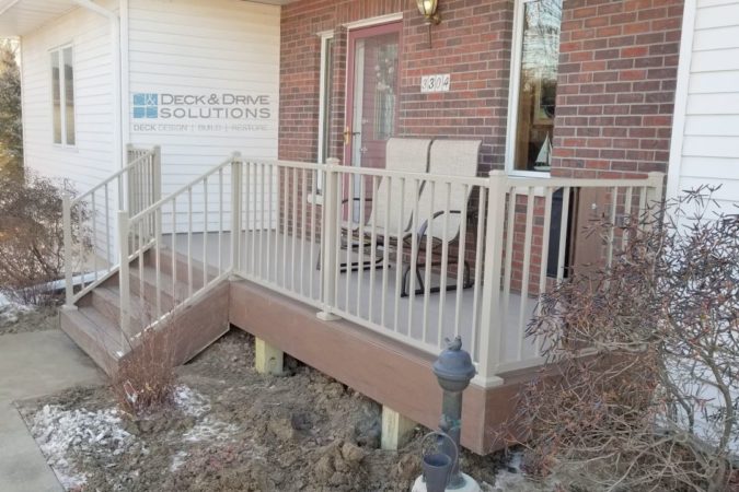 Front Deck with Timbertech Brown Oak & Sandy Birch, Railing is Westbury Tuscany in Clay, built in front of house on Brick