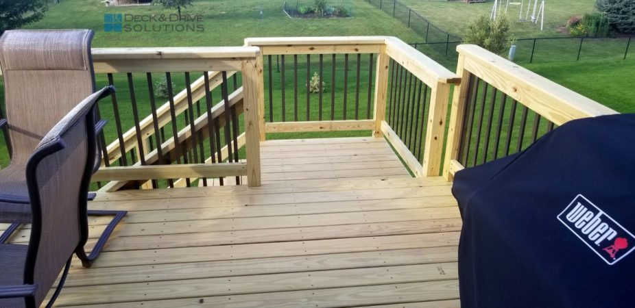 New Treated Decking and Treated Post Rail with Black Metal Spindles