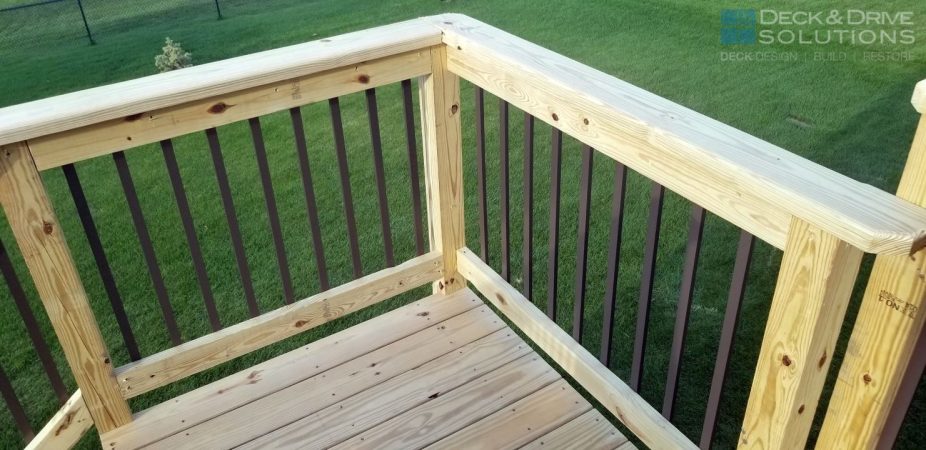 New Treated Decking and Treated Post Rail with Black Metal Spindles