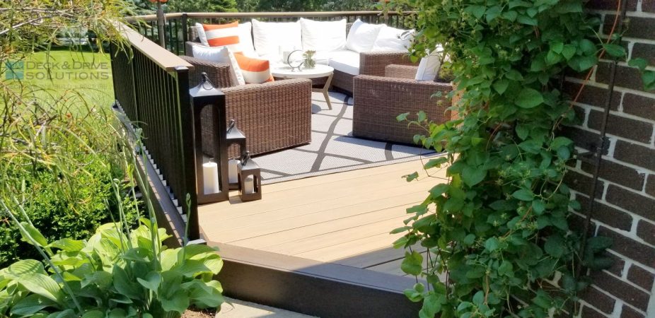 outdoor furniture set with white cushions on Timbertech Deck