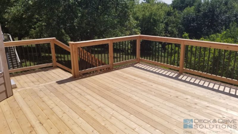 Cedar Decking and Cedar Post Rail with Black Traditional Spindles