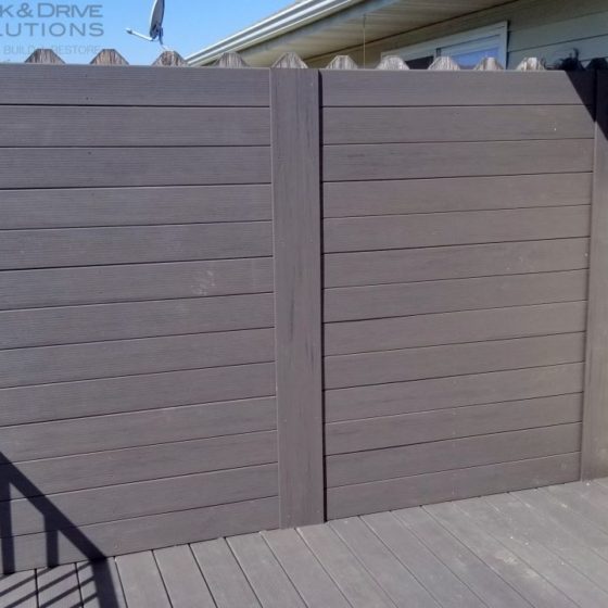 Privacy Wall on deck using Timbertech Espresso Decking and Riser Board