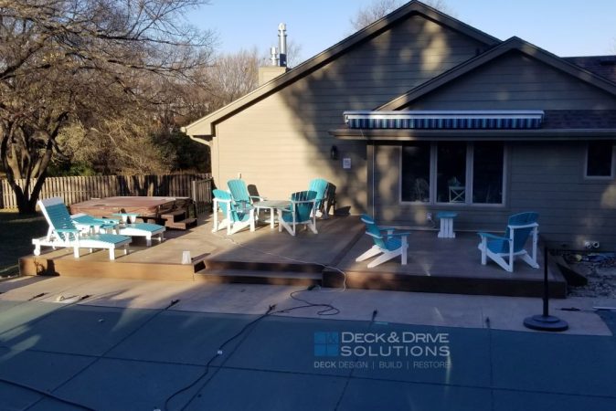 platform composite deck near pool with cover on