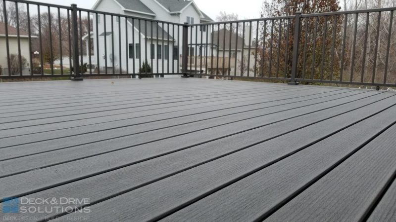 Close picture of Timbertech Espresso Decking, Bronze railing in background