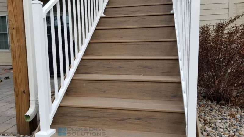 Timbertech Tigerwood deck stairs with white railing