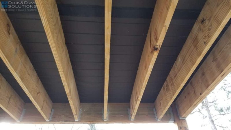 Screen installed over deck framing before decking was installed
