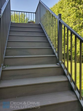 trex composite deck stairs in coastal bluff with bronze westbury railing