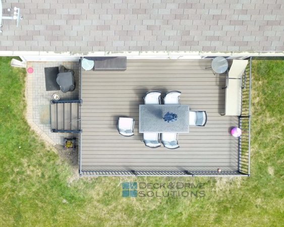 Top of deck layout with furniture of rectangle deck in backyard with eating area