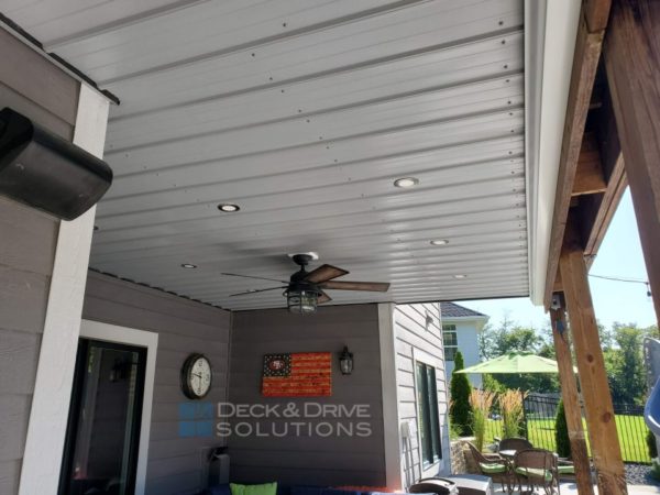 Metal Roofing Deck Ceiling with LED Lights and Ceiing Fan under a deck