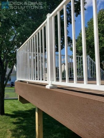white aluminum westbury railing with rustic elm fascia