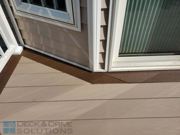 Timbertech Sandy Birch deck floor with rustic elm picture frame accent board