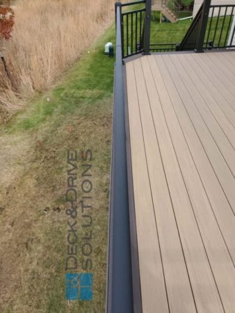 Azek PVC Decking with Weathered Teak and 8" board of Dark Hickory