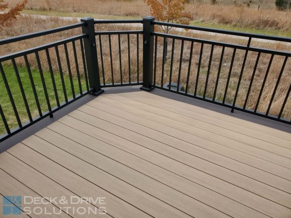 Azek PVC Decking with Weathered Teak and 8" board of Dark Hickory and Westbury aluminum Railing 4" Posts