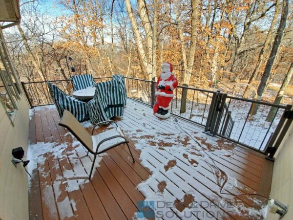 Snow on Timbertech Composite Deck with Santa Clause near Christmas
