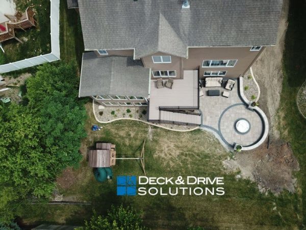 Overhead view of a New Deck with Round Fire Pit Patio below