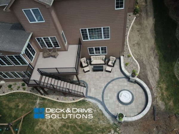 Backyard picture of Composite Deck and Round Firepit Patio