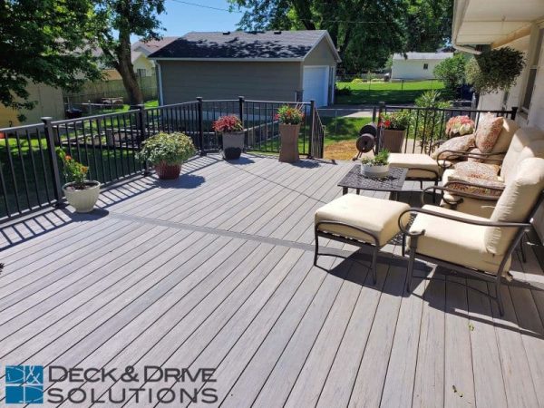Deck flooring with center picture frame board in espresso