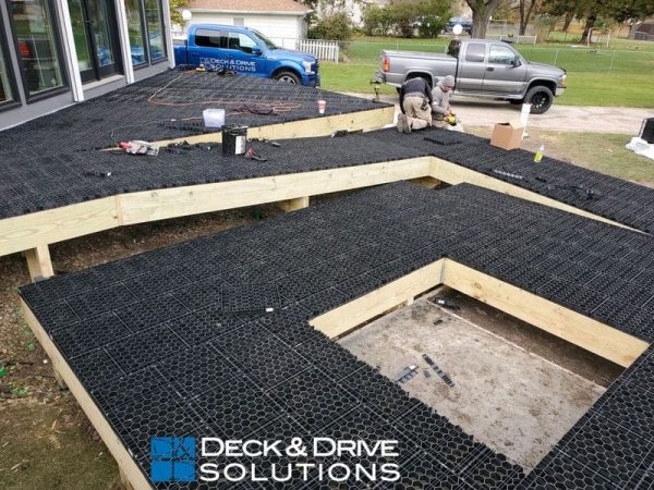 Installed Silca Grate on a deck frame before stone patio pavers are installed