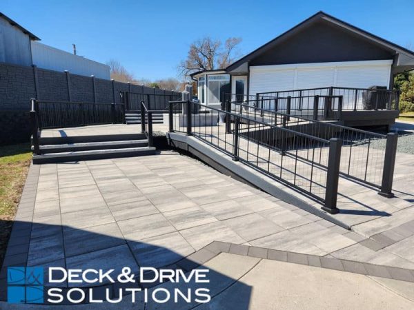 stone deck ramp and stairs with Westbury Verticable Rail